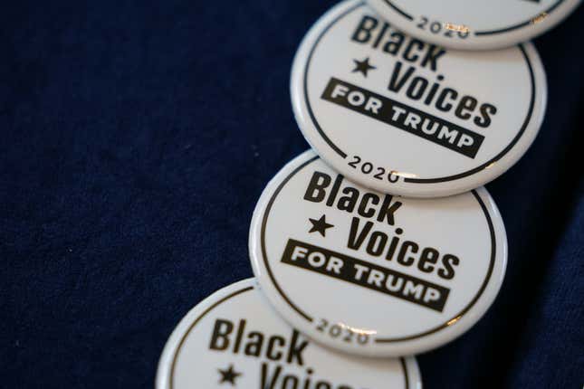 “Black Voices for Trump” pins are displayed on a table before a campaign event for U.S. President Donald Trump, not pictured, in Atlanta, Georgia, U.S., on Friday, Sept. 25, 2020. Trump appealed to Black Americans to help re-elect him, telling them in a speech Friday that Democrats — whom African Americans are poised to overwhelmingly support in November — take their votes for granted. 