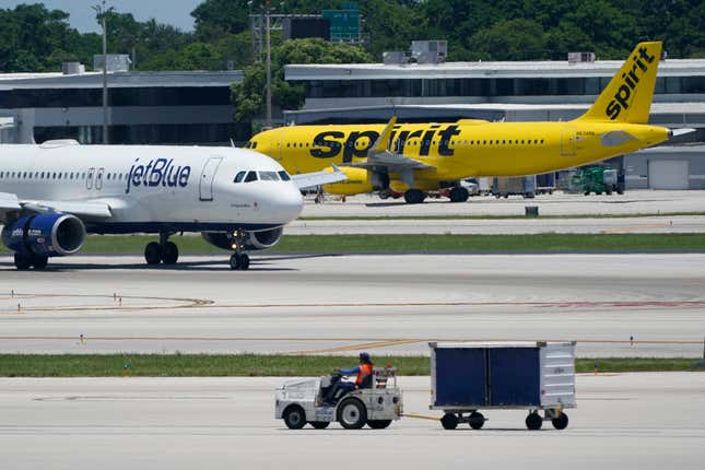 FILE - A JetBlue Airways Airbus A320, left, passes a Spirit Airlines Airbus A320 as it taxis on the runway, July 7, 2022, at the Fort Lauderdale-Hollywood International Airport in Fort Lauderdale, Fla. What&#39;s next for Spirit Airlines, now that it won&#39;t be merging with JetBlue? Some Wall Street analysts are starting to raise the possibility of bankruptcy. Spirit Airlines stock was falling again on Wednesday, Jan 17, 2024, a day after a federal judge blocked JetBlue&#39;s proposed $3.8 billion purchase of Spirit. (AP Photo/Wilfredo Lee, File)