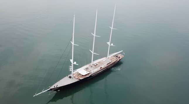 A 417-foot long, three-mast sailing yacht testing in the open ocean. 