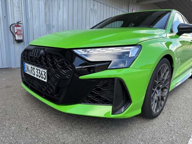 The front end of the 2025 Audi RS3 is painted green