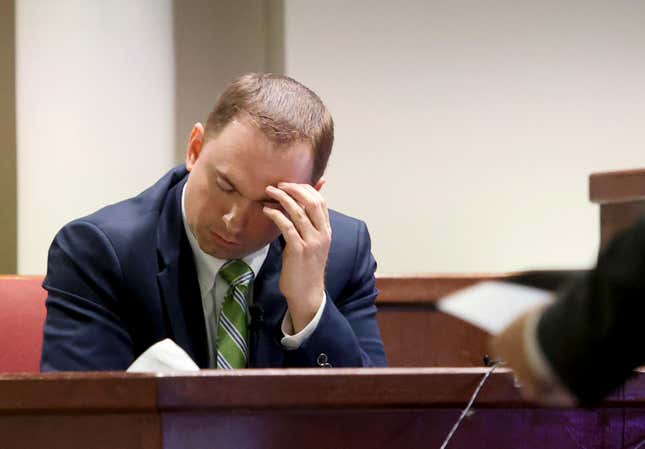 Defendant Aaron Dean reacts while while being cross examined by Assistant Tarrant County Criminal District Attorney Dale Smith on Monday, Dec. 12, 2022, in Fort Worth, Texas. Dean, a former Fort Worth police officer, is accused of fatally shooting Atatiana Jefferson in 2019, during an open structure call. 