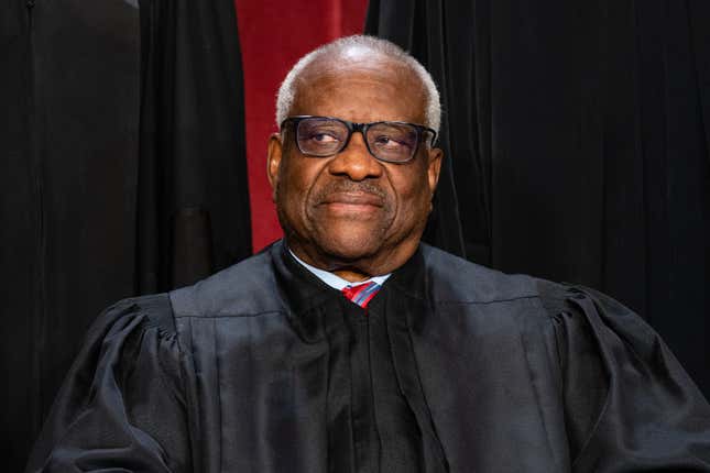 Associate Justice Clarence Thomas during the formal group photograph at the Supreme Court in Washington, DC, US, on Friday, Oct. 7, 2022. The court opened its new term Monday with a calendar already full of high-profile clashes, including two cases that could end the use of race in college admissions.