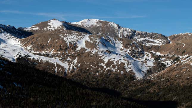 A lack of early season snow leaves mountain peaks in Clear Creek County, Colorado exposed.