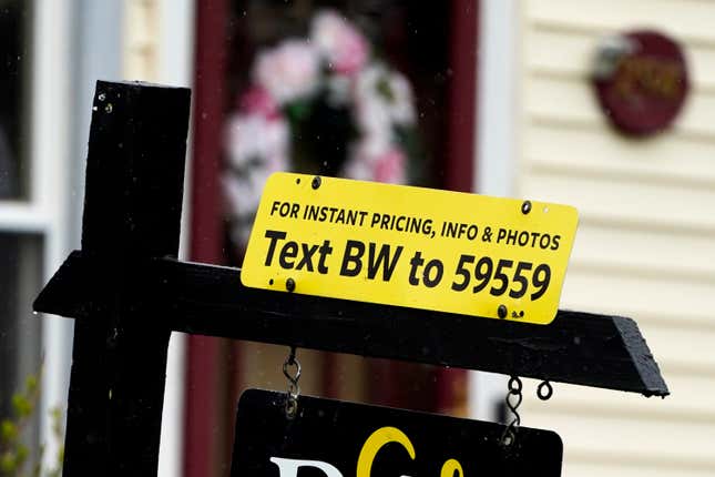 FILE - A sign is displayed outside a home in Wheeling, Ill., Thursday, May 5, 2022. Sometimes hosts offering to rent their vacation home, RV or car through peer-to-peer sharing sites don’t show up at the time they promised to exchange keys. If you can’t get in contact with them, you might have been “ghosted,” leaving you stranded. (AP Photo/Nam Y. Huh, File)