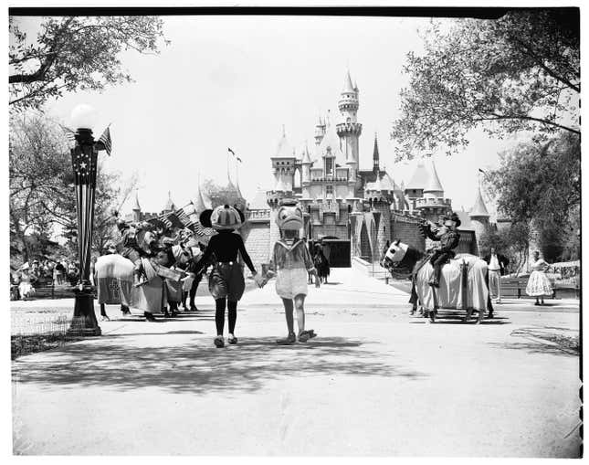 Disneyland opening with the magic kingdom castle in the horizon