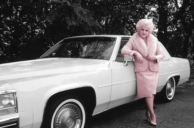 A photo of Mary Kay Ash next to a vintage Cadillac