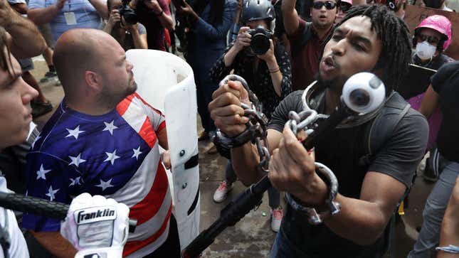 White nationalists exchange insults with counterprotesters during the Unite the Right in August 2017 in Charlottesville, Va. 