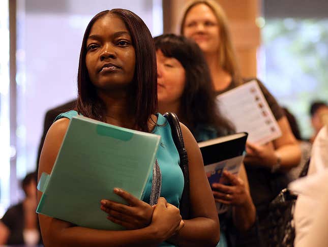 Job seekers line up to meet with a recruiter during a job fair at the Alameda County Office of Education on April 24, 2013, in Hayward, Calif. Six years later, U.S. unemployment numbers are at their lowest levels in five decades, but black unemployment remains almost 90 percent higher than that of almost every other group in the nation.