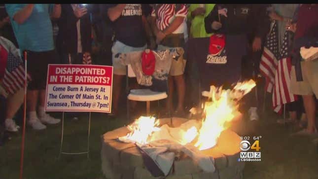 Patriots Fans Gather To Burn Their Stuff