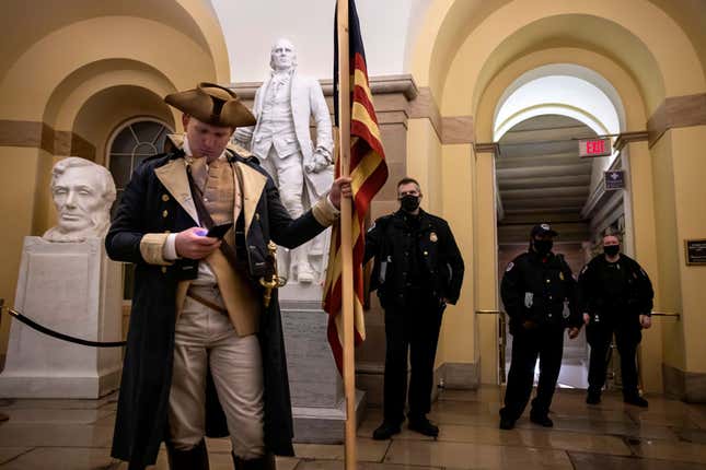 Image for article titled 6 Capitol Officers Suspended (With Pay) for Behavior During Jan. 6 Insurrection; 29 More Under Investigation