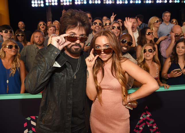 Billy Ray Cyrus and Brandi Cyrus at the 2016 CMT Awards, via Getty