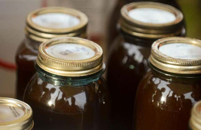 Mason jars full of apple butter