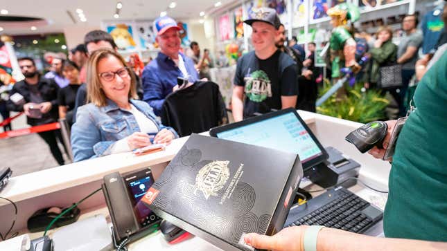 A crowd gathers to purchase The Legend of Zelda: Tears of the Kingdom at the Nintendo store.