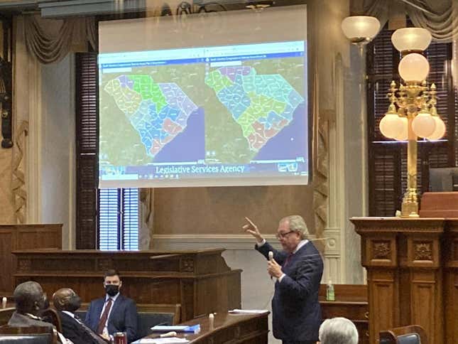 State Sen. Dick Harpootlian, D-Columbia, compares his proposed map of U.S. House districts drawn with 2020 U.S. Census data to a plan supported by Republicans on Jan. 20, 2022, in Columbia, S.C. Federal judges are deciding whether South Carolina’s new congressional maps are legal in a lawsuit by the NAACP which says the districts dilute Black voting power. 