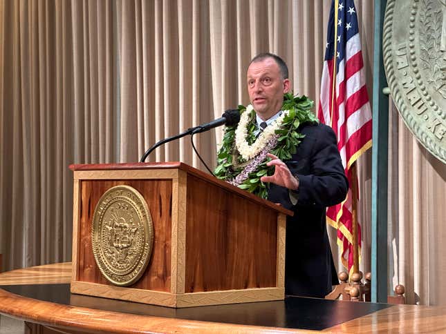 Hawaii Gov. Josh Green speaks to reporters in Honolulu on Monday, Jan. 22, 2024, after delivering his State of the State address at the Hawaii State Capitol. (AP Photo/Audrey McAvoy)