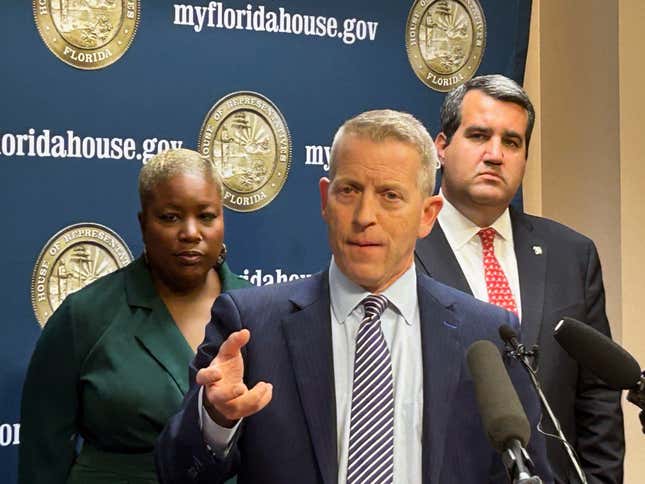 Florida&#39;s Republican House Speaker Paul Renner discusses Gov. Ron DeSantis&#39; veto of a bill that would have banned kids under 16 from social media regardless of parental consent, in Tallahassee, Fla., Friday, March 1, 2024. A new proposal lowers that age to 14. He was joined by Democratic Rep. Michele Rayner, left, and Republican Rep. Tyler Sirois, right. (AP Photo/Brendan Farrington)