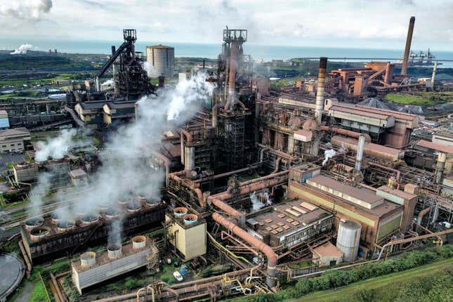 FILE - A view of Tata Steel&#39;s Port Talbot steelworks in south Wales, Sept. 15, 2023. Indian firm Tata Steel says it will close both blast furnaces at its plant in Port Talbot, Wales, with the loss of about 3,000 jobs. (Ben Birchall/PA via AP)