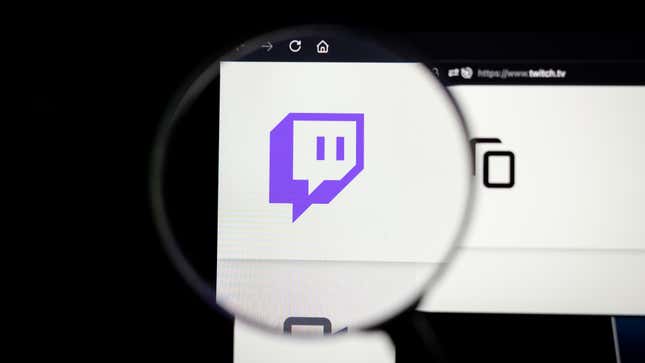 A magnifying glass hovers over the Twitch on an internet browser's webpage.