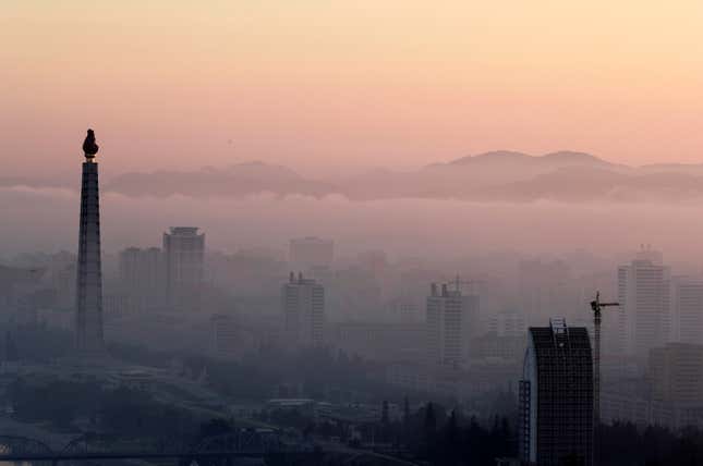 Morning fog blankets Pyongyang.