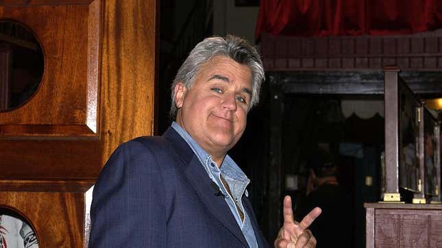 Jay Leno flashing peace sign
