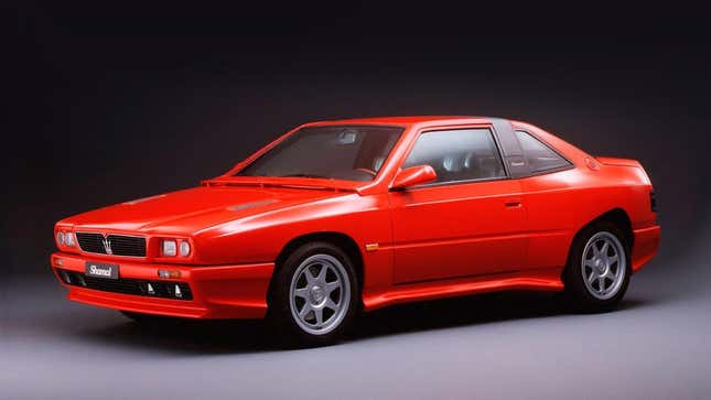 Front 3/4 view of a red Maserati Shamal