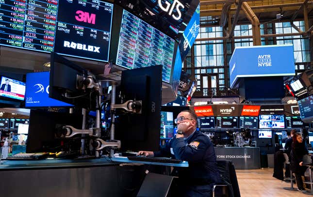 FILE = Traders work on the floor of the New York Stock Exchange Wednesday, March 20, 2024. U.S. markets are far outpacing their global counterparts in 2024, continuing a decades-long trend of strong growth compared with the rest of the world. (AP Photo/Craig Ruttle, File)