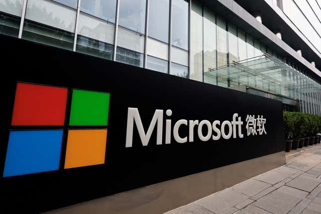 microsoft logo on a sign with Chinese letters at the end