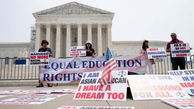 People protest outside of the Supreme Court in Washington, Thursday, June 29, 2023. The Supreme Court on Thursday struck down affirmative action in college admissions, declaring race cannot be a factor and forcing institutions of higher education to look for new ways to achieve diverse student bodies. 