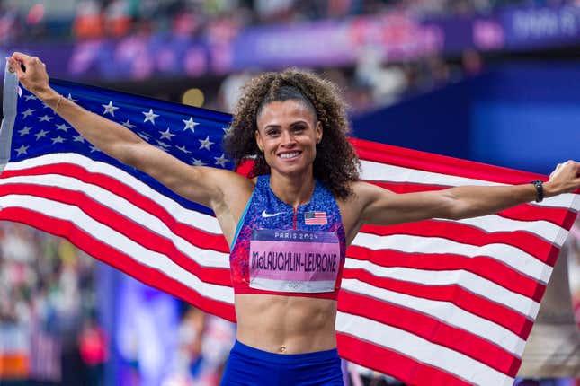 Sydney McLaughlin-Levrone of Team United States celebrates winning the Gold medal with team mates in the Women’s 4 x 400m Relay Final on day fifteen of the Olympic Games Paris 2024 at Stade de France on August 10, 2024 in Paris, France.