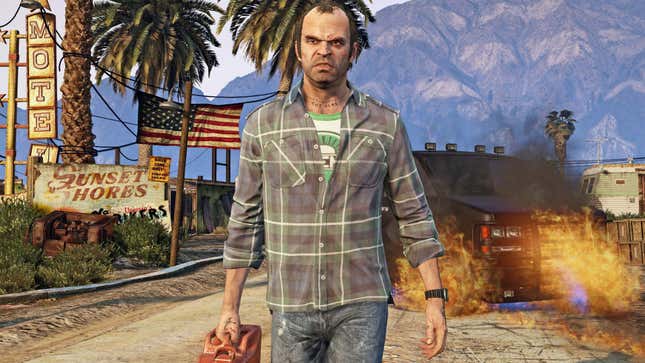 Trevor walks away from a burning car.