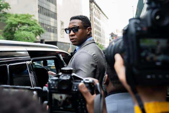 Jonathan Majors, looks backs at media while leaving Manhattan Criminal court after his pre trial hearing on August 03, 2023 in New York City.