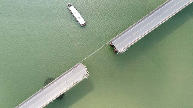 A photo of the bridge in China with a section missing. 