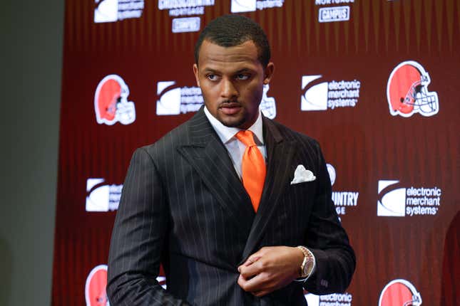 Cleveland Browns new quarterback Deshaun Watson enters a news conference at the NFL football team’s training facility, Friday, March 25, 2022, in Berea, Ohio. 