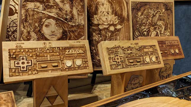 Wooden video game controllers sit on display.
