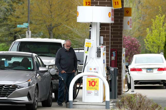 A customer fills up his vehicle&#39;s gas tank at a gas station in Buffalo Grove, Ill., Tuesday, April 23, 2024. On Tuesday, April 30, 2024, the Conference Board reports on U.S. consumer confidence for April. (AP Photo/Nam Y. Huh)