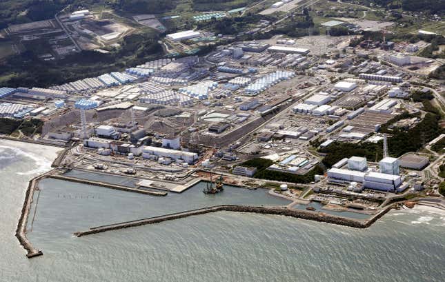 FILE - This aerial view shows the wrecked Fukushima Daiichi nuclear power plant in Okuma town, northeastern Japan, on Aug. 24, 2023. A drone small enough to fit in one&#39;s hand flew inside one of the damaged reactors at the wrecked nuclear power plant Wednesday, Feb. 28, 2024, in hopes it can examine some of the molten fuel debris in areas where earlier robots failed to reach. (Kyodo News via AP, File)