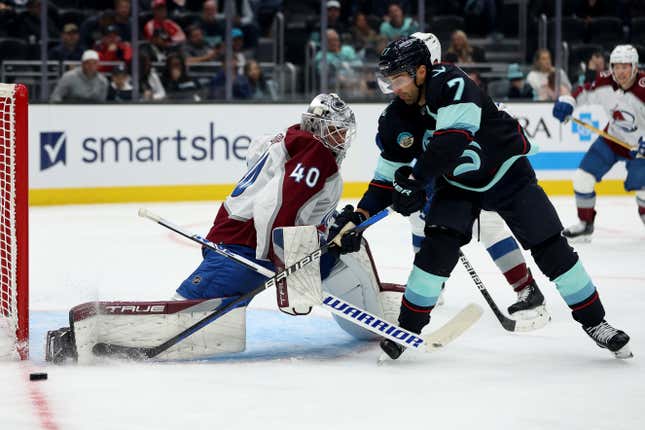 SEATTLE, WASHINGTON - OCTOBER 17: Alexandar Georgiev #40 of the Colorado Avalanche makes a pad save against Jordan Eberle #7 of the Seattle Kraken during the second period at Climate Pledge Arena on October 17, 2023 in Seattle, Washington. (Photo by Steph Chambers/Getty Images)