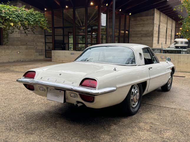 Rear 3/4 view of a white Mazda Cosmo 110S