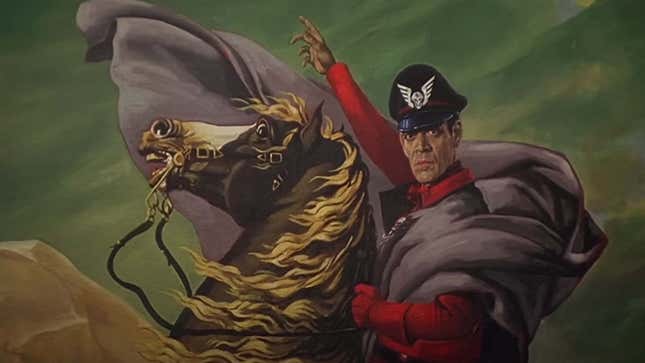 A screenshot shows M. Bison's painting from the Street Fighter movie. 