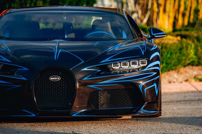 Front end view of a blue and black Bugatti Chiron Super Sport