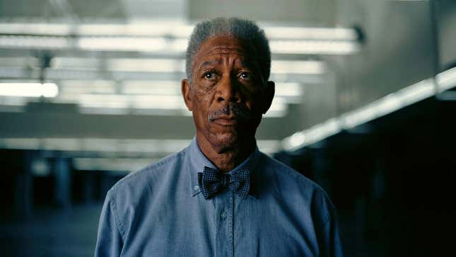 Lucius Fox looking suspicious