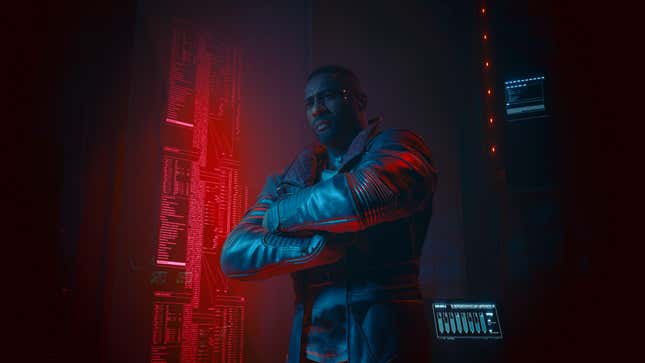 Idris Elba's character in Cyberpunk 2077: Phantom Liberty stands in front of a computer display.
