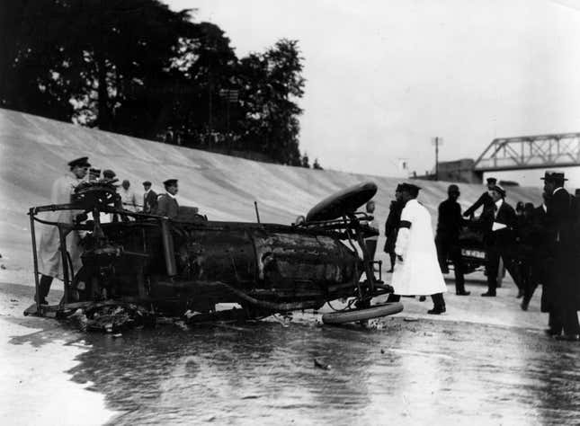 1907: A damaged Minerva racing car, belonging to the English aviator and politician John Theodore Cuthbert Moore-Brabazon, on its side on the track at Brooklands, after an accident in the sixth race