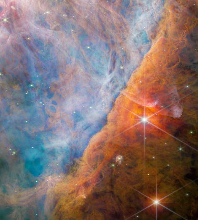 A section of the Orion Nebula where ultraviolet light interacts with molecular clouds.