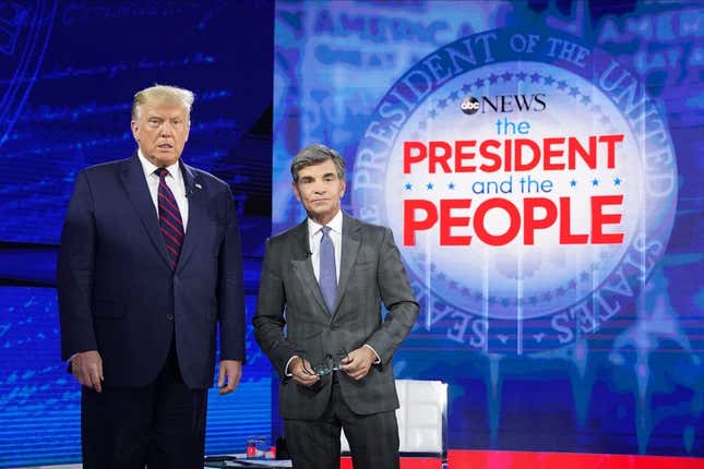 President Donald Trump poses with ABC New anchor George Stephanopoulos ahead of a town hall event at the National Constitution Center in Philadelphia, Pennsylvania on September 15, 2020.