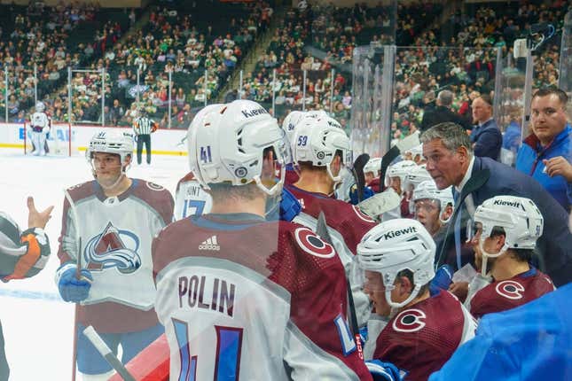 Sep 28, 2023; Saint Paul, Minnesota, USA; Colorado Avalanche head coach Jared Bednar talks with the team during a break against the Minnesota Wild in the third period at Xcel Energy Center.