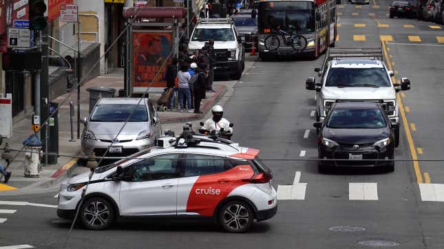 A Chevrolet Cruise autonomous vehicle with a driver moves through an intersection on June 08, 2023 in San Francisco, California