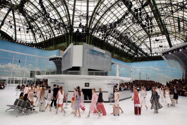 Models wear creations for Chanel's Spring-Summer 2016 ready-to-wear fashion collection presented during the Paris Fashion Week, Tuesday, Oct. 6, 2015 in Paris, France. (AP Photo/Francois Mori)