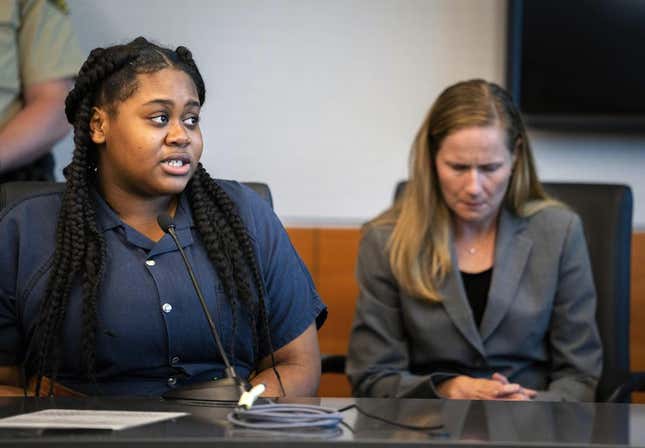 Pieper Lewis, left, speaks with Polk County District Judge David M. Porter during her sentencing hearing, Tuesday, Sept. 13, 2022. Lewis, who was initially charged with first-degree murder after she stabbed her accused rapist to death in June 2020, was sentenced to five years of closely supervised probation and ordered to pay $150,000 restitution to the man’s family. 
