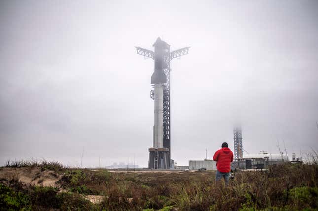 A visitor walks near the launch site of the SpaceX Starship rocket on January 14, 2025, near Boca Chica, Texas.